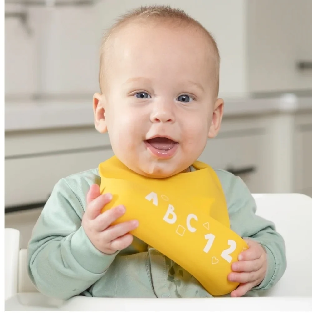 Bella Tunno Little Bites Silicone Bib NWT Learn to Eat Beginner 0+ ABCs Yellow